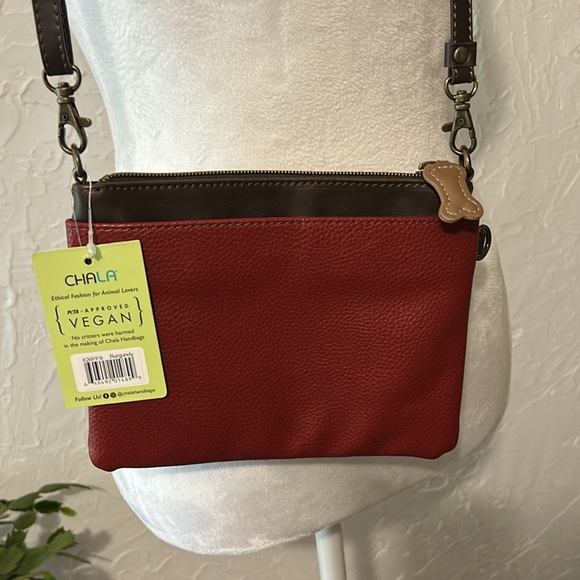 Chala Crossbody
Red Crossbody Bag with Paw Print Design
New with Tags - Picture 3 of 4